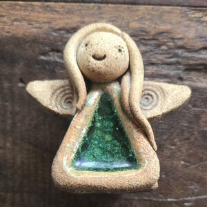 Handcrafted Angel Figurine with Green Glass
